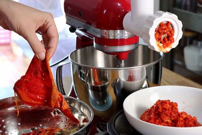 grinding vegetables for home cooked ajvar