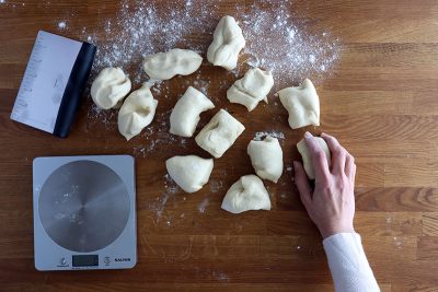 love bird buns portioning the dough with precision